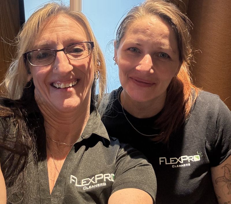 Two FlexPro team members in FlexPro shirts